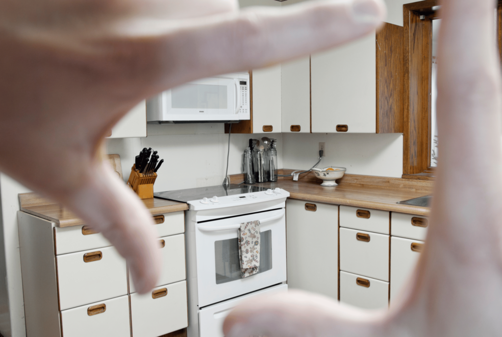 Finger framing to visualize a new kitchen design
